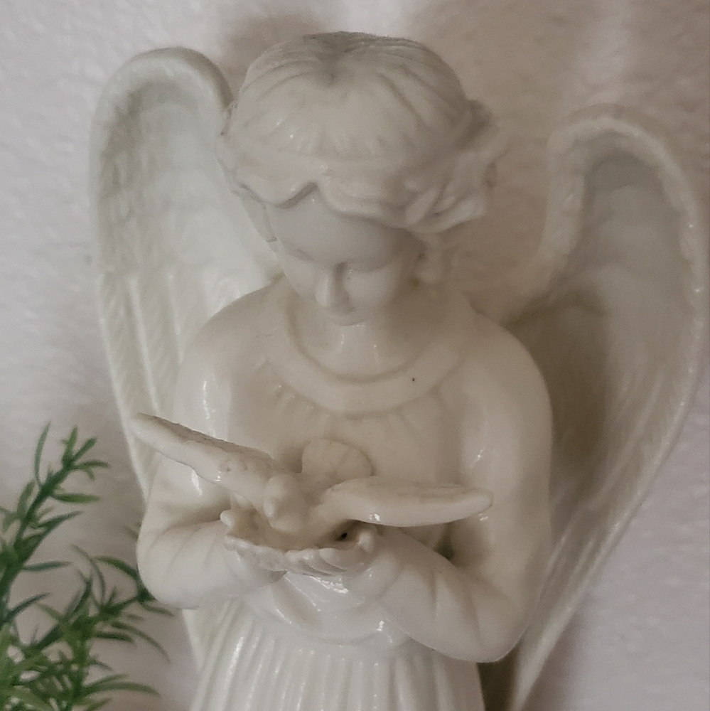 Ceramic Angel holding Dove 🕊 Measures 11.5" tall